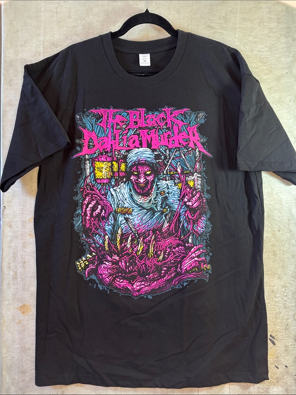 Graphic Tee — Black with Pink & Blue Print